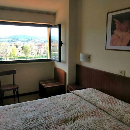 Columbus Urban Resort Firenze Kültér fotó A room at the hotel