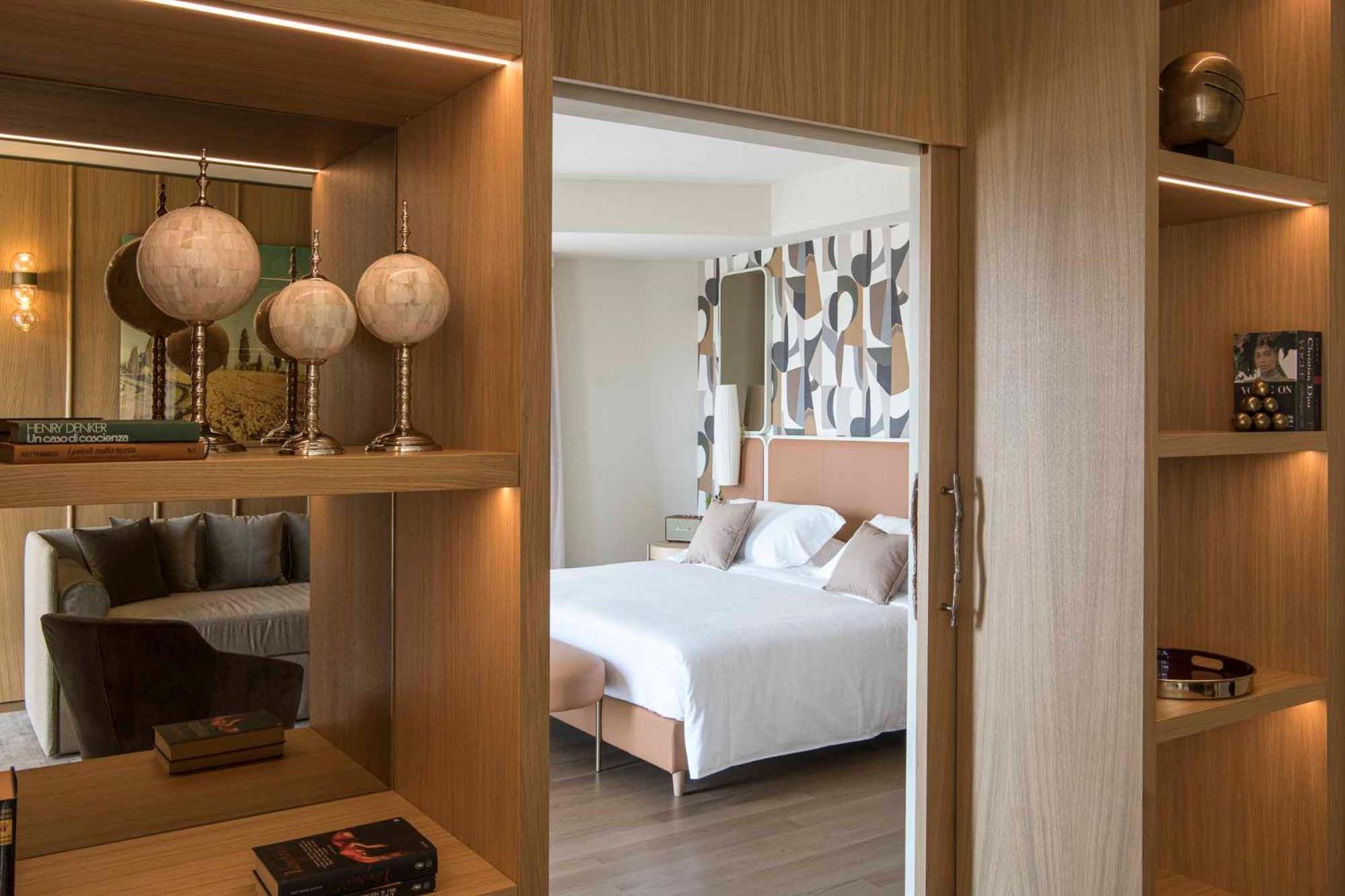 Columbus Urban Resort Firenze Kültér fotó A bedroom at the hotel